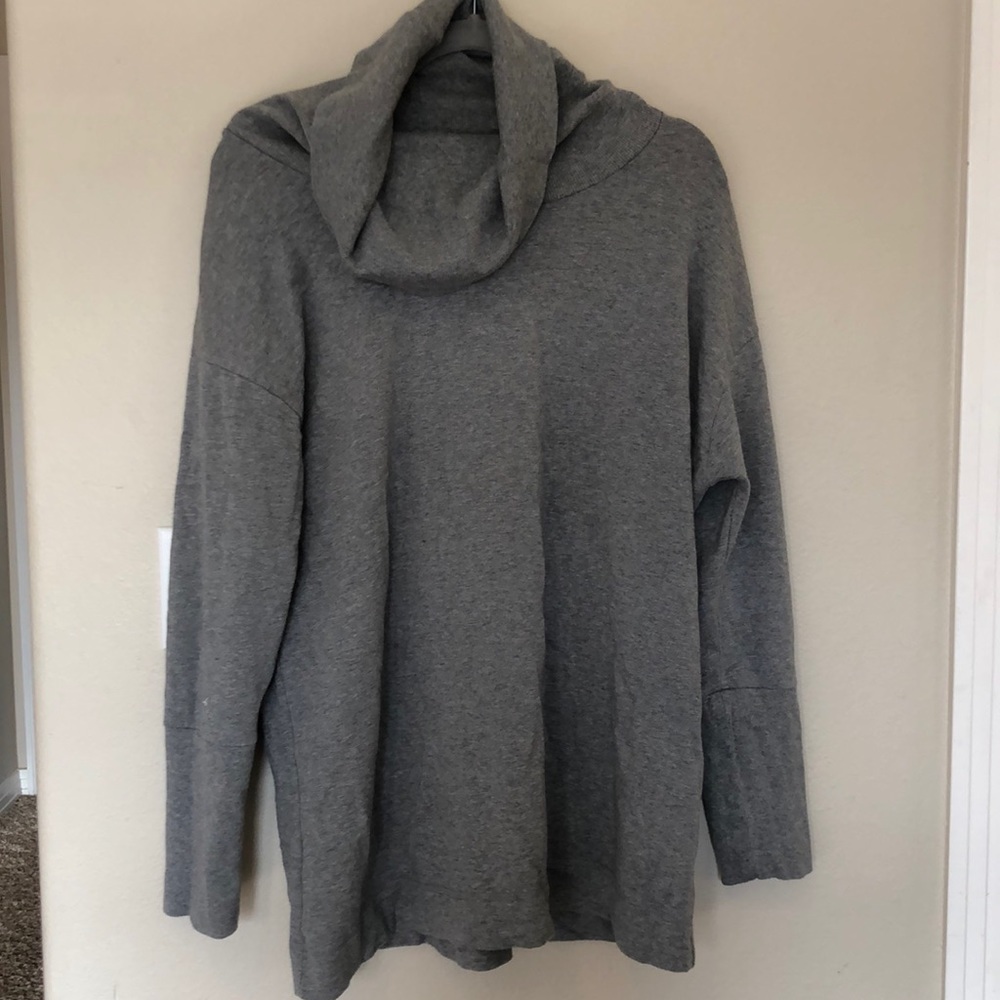 Great long turtle neck sweater. Size XL